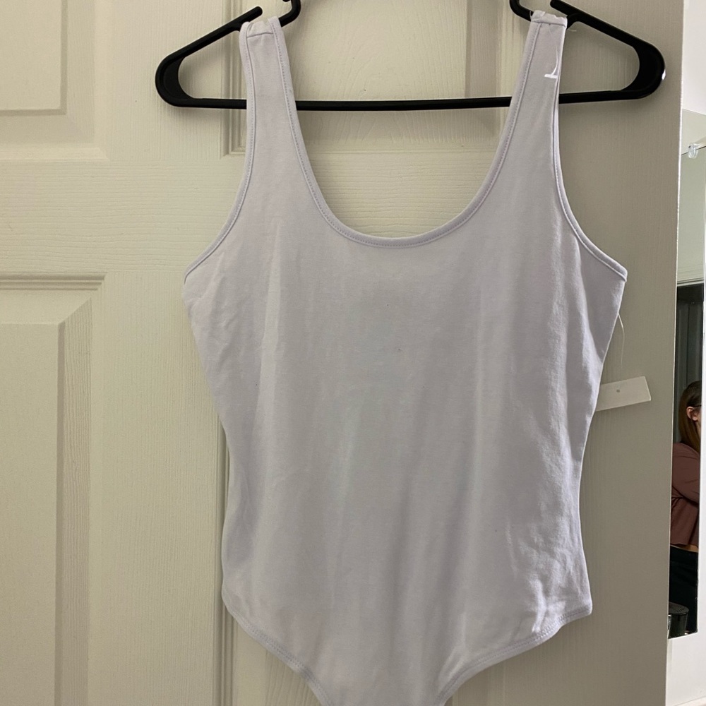 Brand new WITH tags white thong bodysuit.